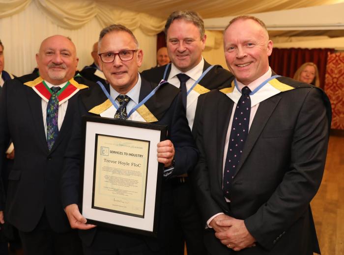 2022 fellows gowning services to industry trevor hoyle with fellows group 700