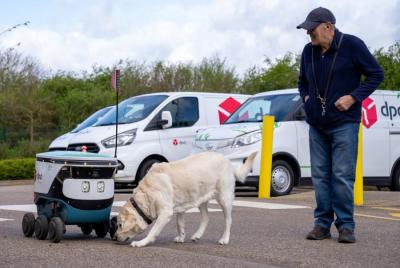 DPD helps guide dog Amelia make friends with delivery robot